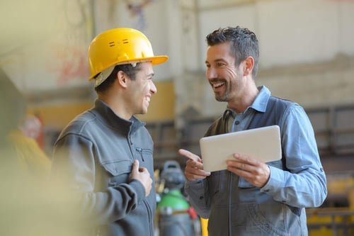 stock-photo-workers-talking-and-laughing-at-a-factory-648243124-550482-edited.jpg